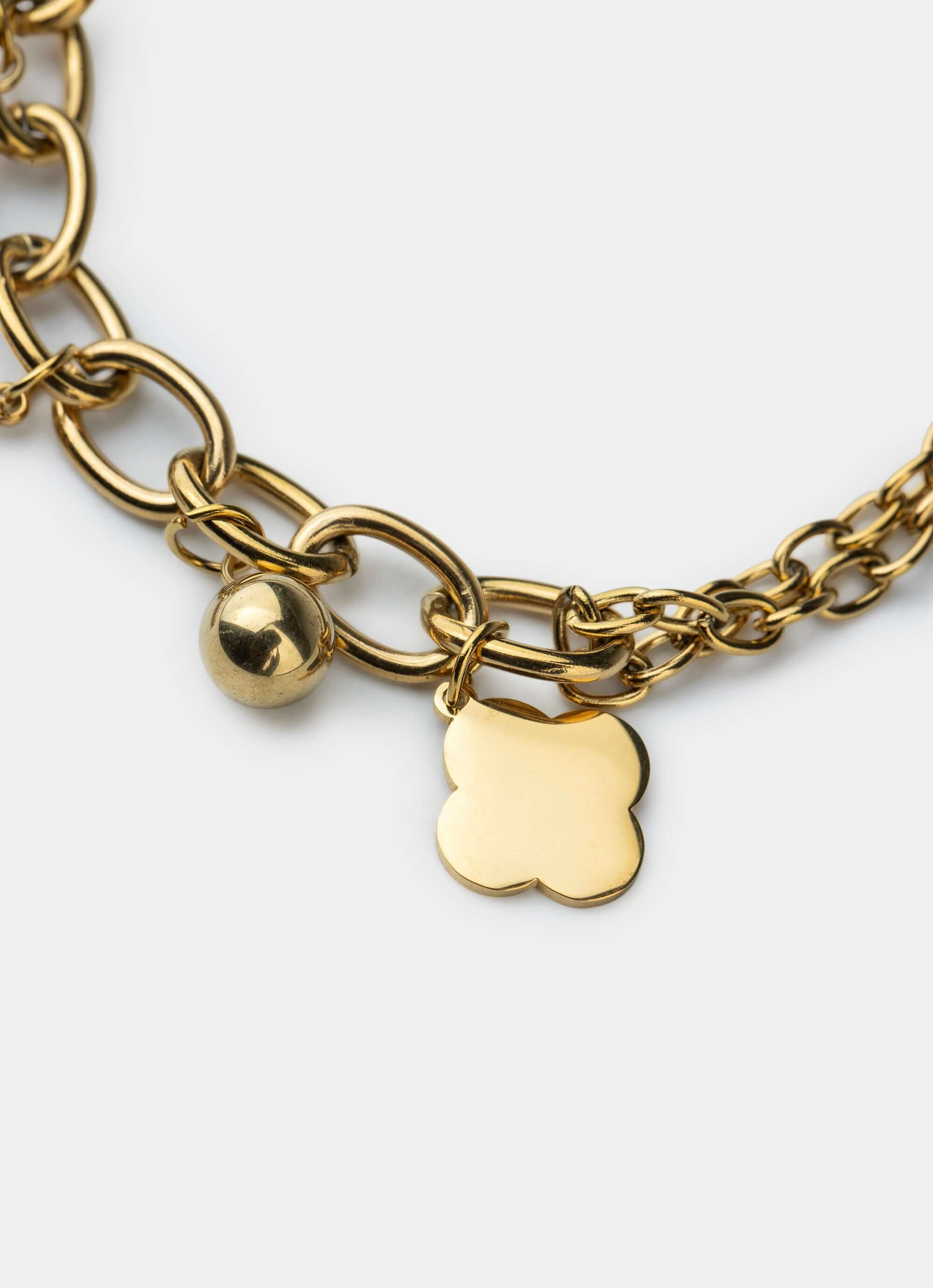 Gold plated charm bracelet – four leaf charms – Vendetta Jewellery