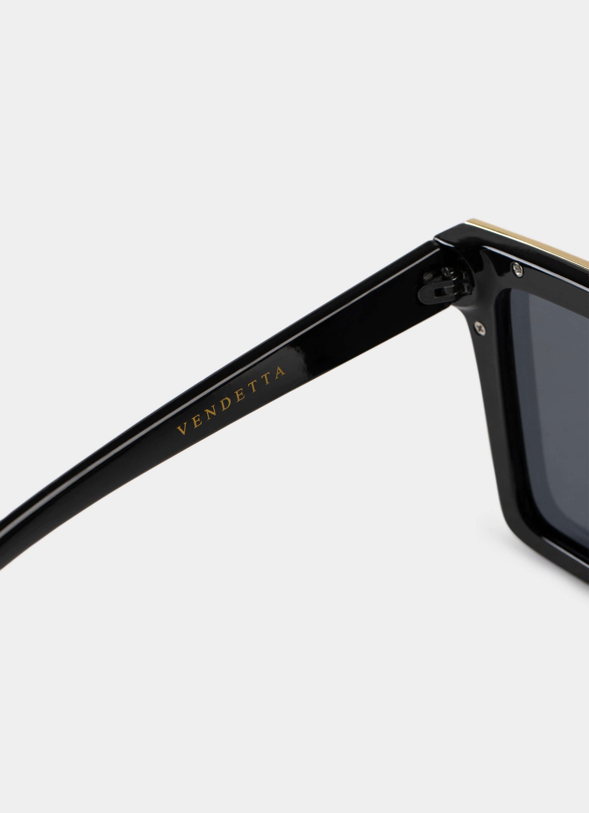 black and gold sunglasses – side view – Vendetta Jewellery